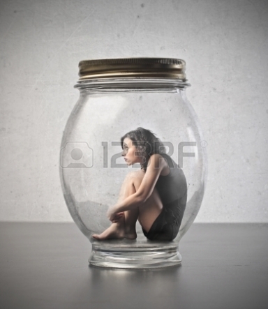 13037632-young-woman-trapped-in-a-glass-jar